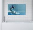 Ceramic tile mural with leaping swordfish and ocean waves