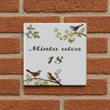 Ceramic house number sign with bird branch leaf and flower motif