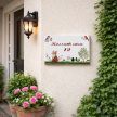Ceramic house number sign with fox bird and tree motif