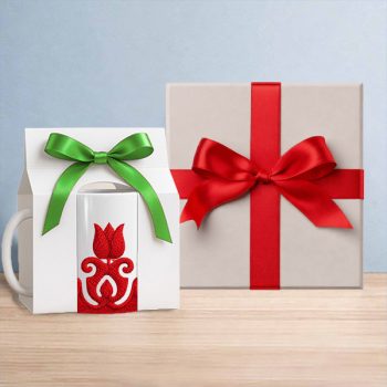 Hungarian pattern tile trivet and ceramic mug with colorful Hungarian folk tulip motifs