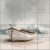 Coastal decorative tile mural with boat, seagulls, and gentle sea waves