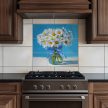 Daisy bouquet ceramic tile mural with polka dot ribbon on blue background