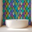 Bathroom tile mural with colorful stained glass style pattern