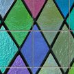 Colorful stained glass style tile mural with diamond shapes and black outlines