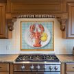 Plated lobster with lemon slices – ceramic tile mural for kitchen decor