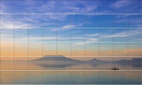 Ceramic tile mural of Badacsony at sunset with a rowing boat and lake reflections