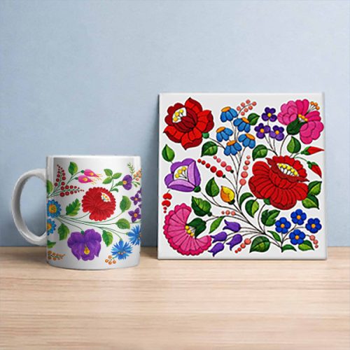 Kalocsa pattern tile trivet and ceramic mug with colorful Hungarian folk floral motifs