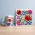 Kalocsa pattern tile trivet and ceramic mug with colorful Hungarian folk floral motifs