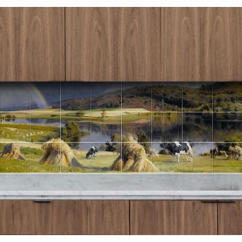 Ceramic tile mural of a countryside scene with cows, hay and a rainbow