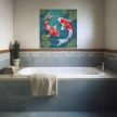 Tile mural with two red and white koi fish and lotus leaves in Japanese style