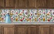 Ceramic tile mural with wildflowers on white background