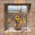 Tile mural with vase of sunflowers in stone window, with hills in background – rustic ceramic tile