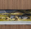 Ceramic tile mural of a countryside scene with cows, hay and a rainbow