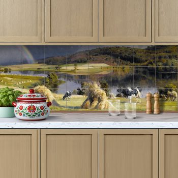 Ceramic tile mural with cow and landscape motif