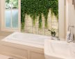 Ceramic tile mural with cascading ivy vines on a rustic brick wall