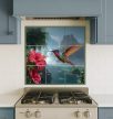 Colorful hummingbird near hibiscus flower with tropical waterfall background – exotic tile mural