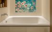 Floating plumeria flowers on clear water – tropical tile mural