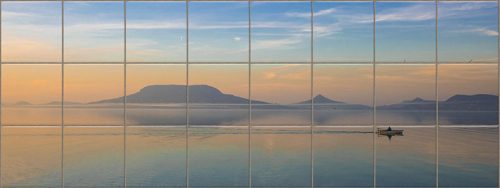 Ceramic tile mural of Badacsony at sunset with a rowing boat and lake reflections