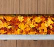Ceramic tile mural with detailed autumn maple leaves in warm red, orange, and yellow tones