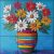 Tile mural with vivid daisies in a multicolored striped vase on a blue background