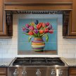 Tile mural with colorful tulips in a striped vase on blue background