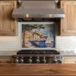 Mediterranean ceramic tile mural with sailboats, seaside houses and a sunny harbor view