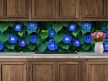 Ceramic tile mural with blue morning glories and rich green leaves