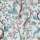 Chinoiserie tile mural with brown branches, pink and blue flowers, and decorative birds on light blue background