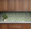 Green willow leaf ceramic tile mural in William Morris style on cream background