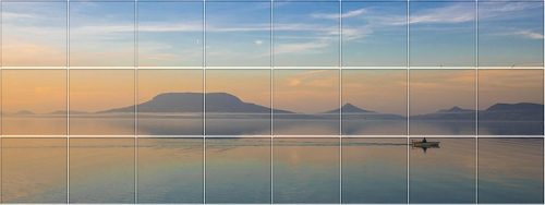 Ceramic tile mural of Badacsony at sunset with a rowing boat and lake reflections