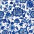 Chinoiserie-style ceramic tile mural with blue floral and leaf motifs on white background