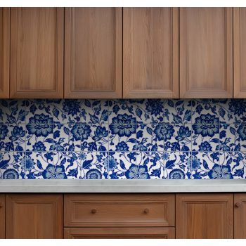 Chinoiserie-style ceramic tile mural with blue floral and leaf motifs on white background
