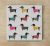 Dachshunds in sweater tile trivet