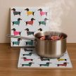 Dachshunds in sweater tile trivet