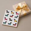 Dachshunds in sweater tile trivet