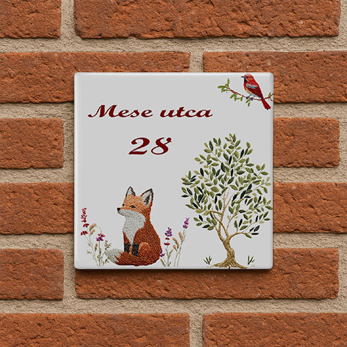 Ceramic house number sign with fox bird and tree motif