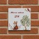 Ceramic house number sign with fox bird and tree motif