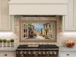Mediterranean window tile mural – Tuscan street with floral houses and scenic hill view