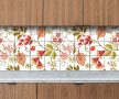 Tile mural with red rosehips, stylized flowers, and flowing vines
