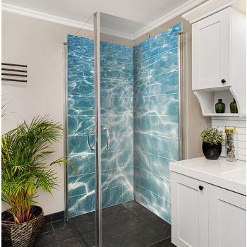 Ceramic tile mural featuring sunlight reflections on clear blue water